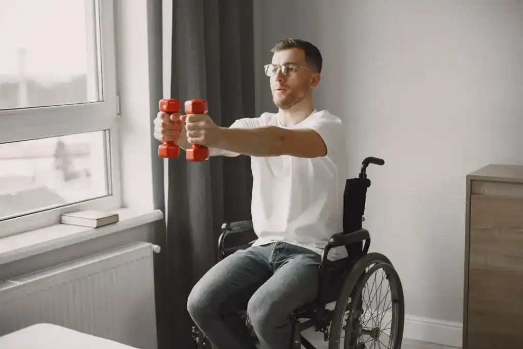 Empowering Weight Loss: A Comprehensive Guide for Individuals with Disabilities 1 Image of man doing exercise in his wheelchair to aid weight loss St Albans