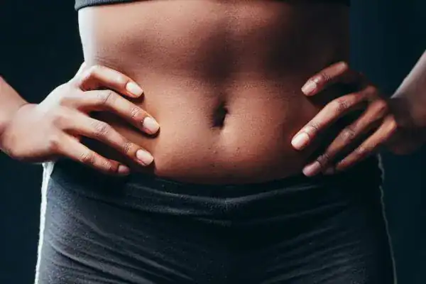 Toning Your Stomach: The Ultimate Guide to Achieving a Sculpted Stomach While Shedding Pounds 1 Image of a toned stomach after non surgical treatment St Albans